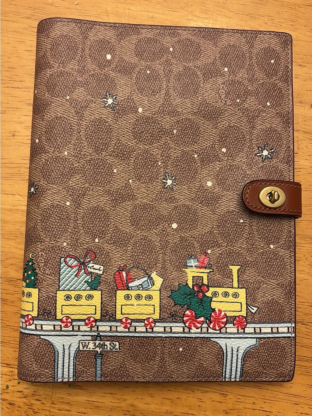 Coach Brown Signature Canvas Holiday Train Notebook Cover with turn lock nwt